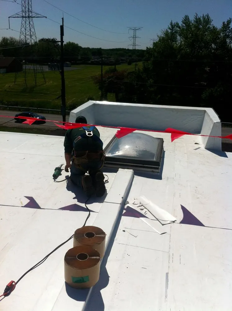 Slide of M&M Commercial Roofing