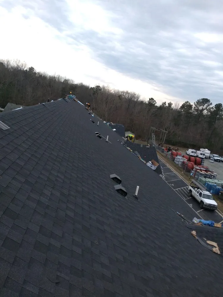 Slide of M&M Construction Roofing