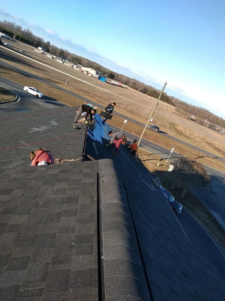 Slide of M&M Construction Roofing