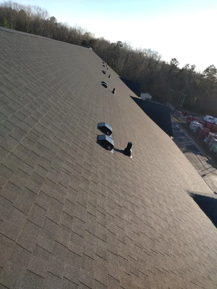 Slide of M&M Construction Roofing