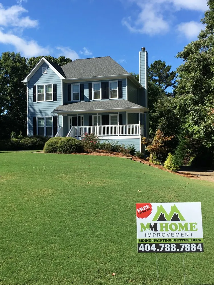 Slide of M&M Home Exteriors