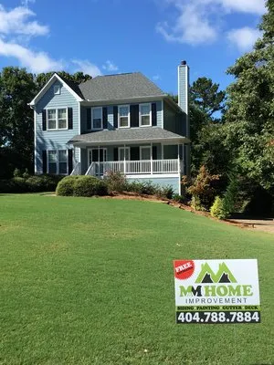 M&M Home Exteriors Logo