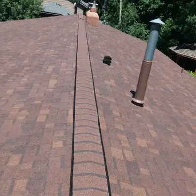 M&M Roofing and Construction Logo