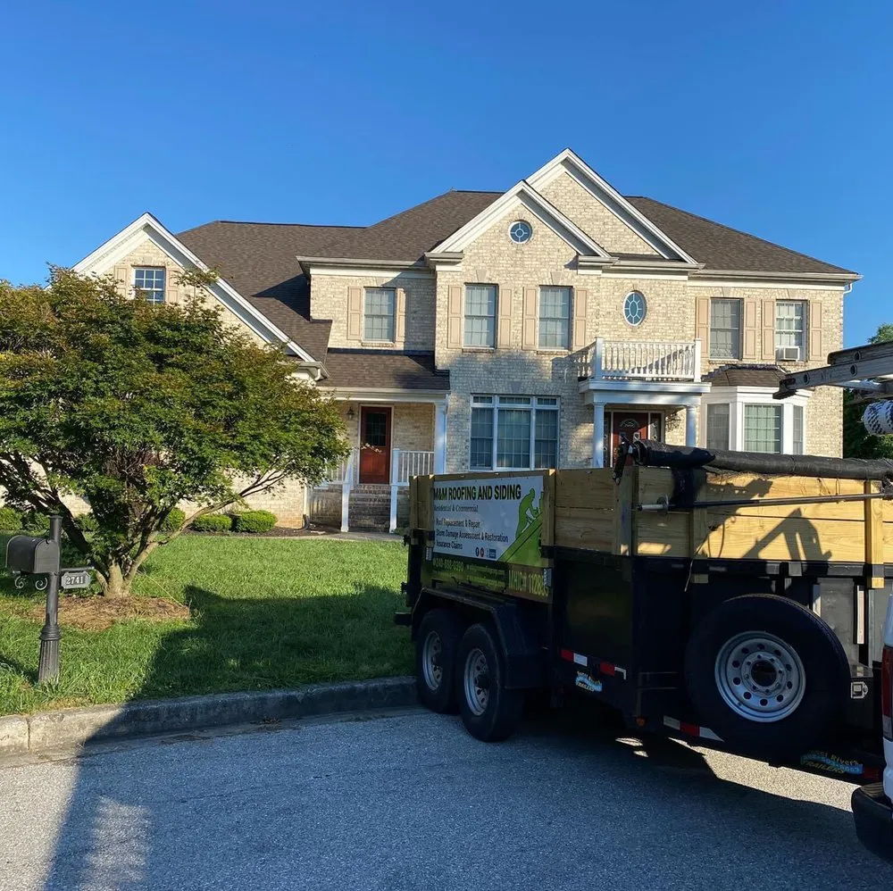 Slide of M&M Roofing And Siding