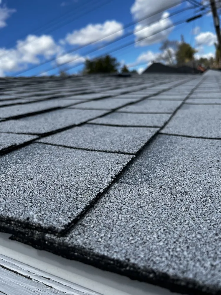 Slide of M&M Roofing