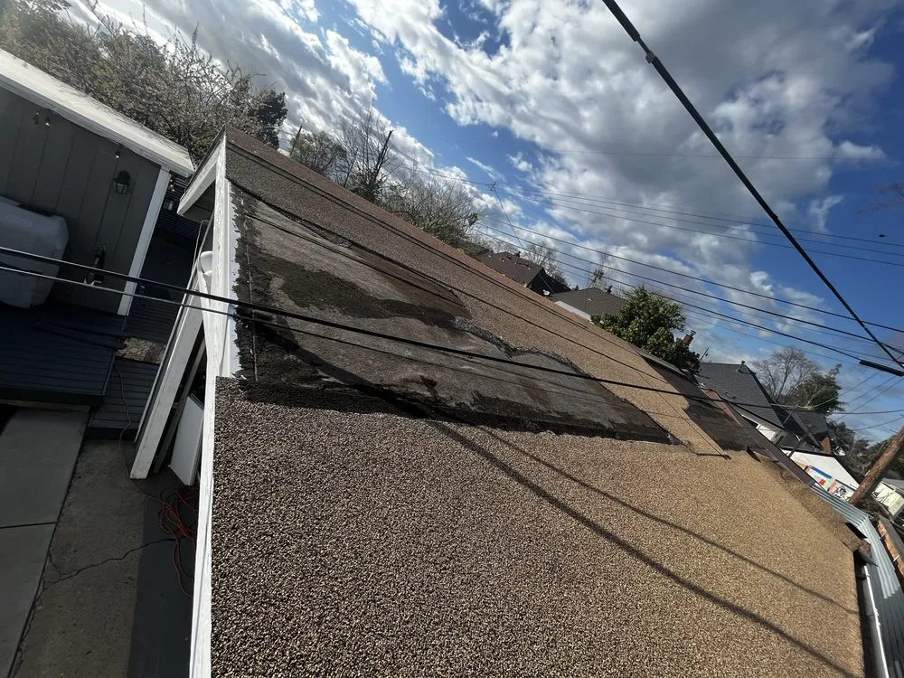 Slide of M&M Roofing