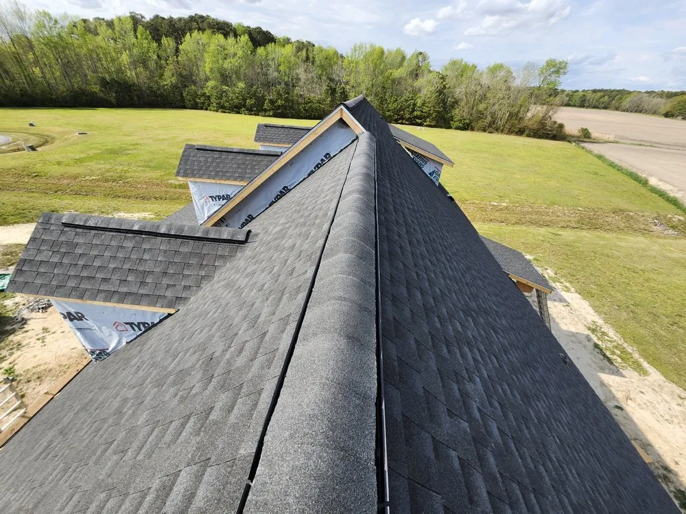 Slide of M&M Roofing