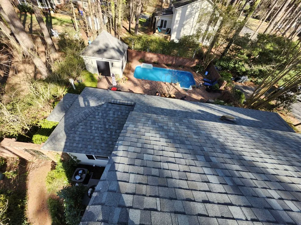 Slide of M&M Roofing