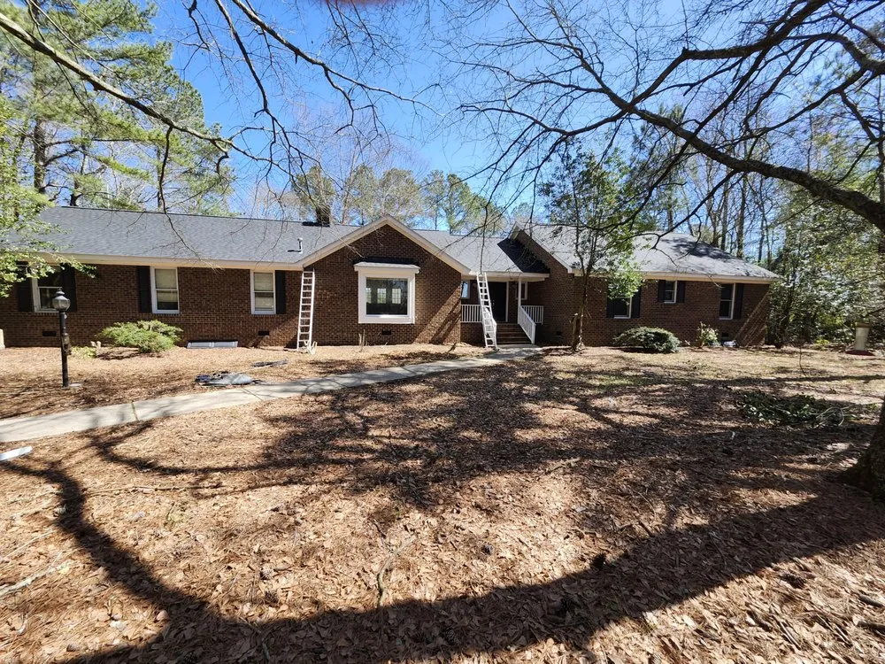 Slide of M&M Roofing