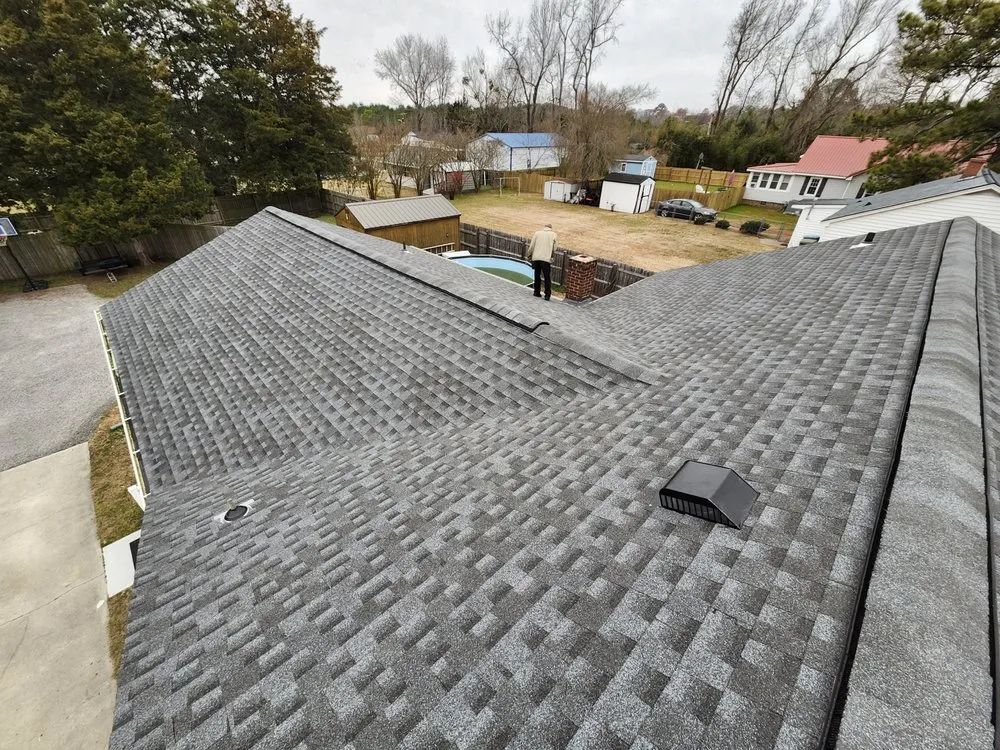 Slide of M&M Roofing