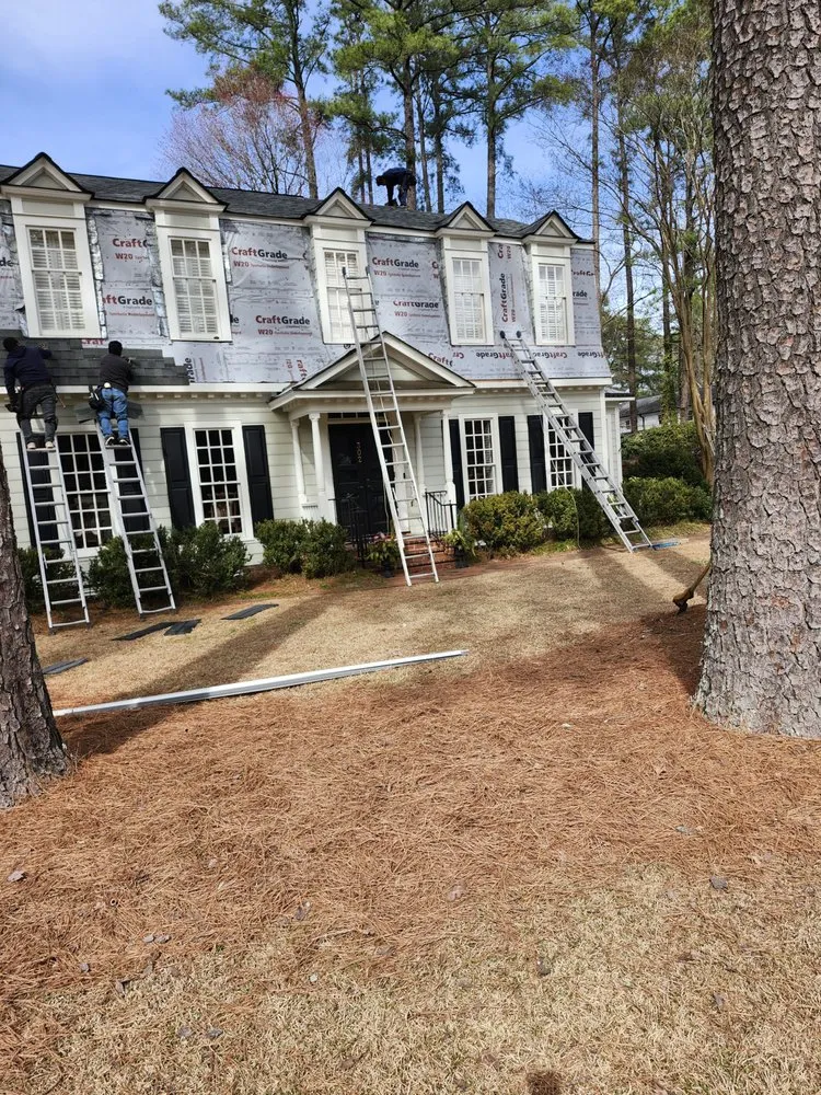 Slide of M&M Roofing