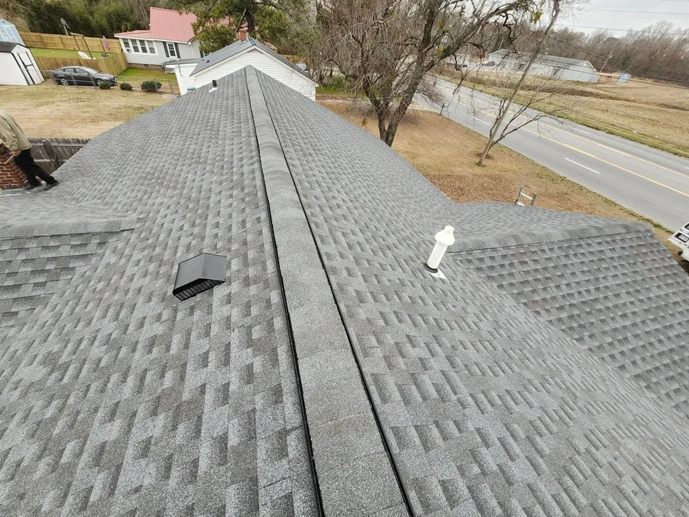 Slide of M&M Roofing