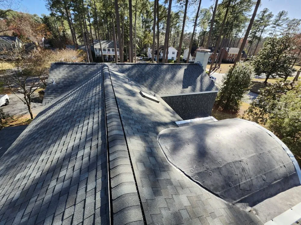 Slide of M&M Roofing