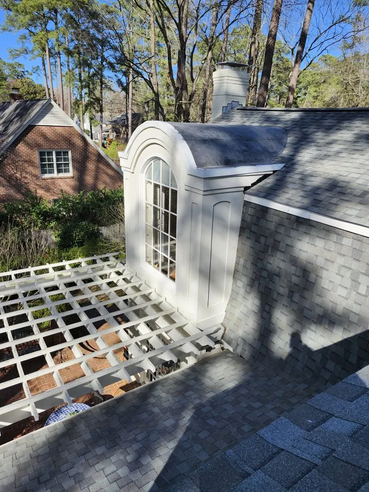 Slide of M&M Roofing