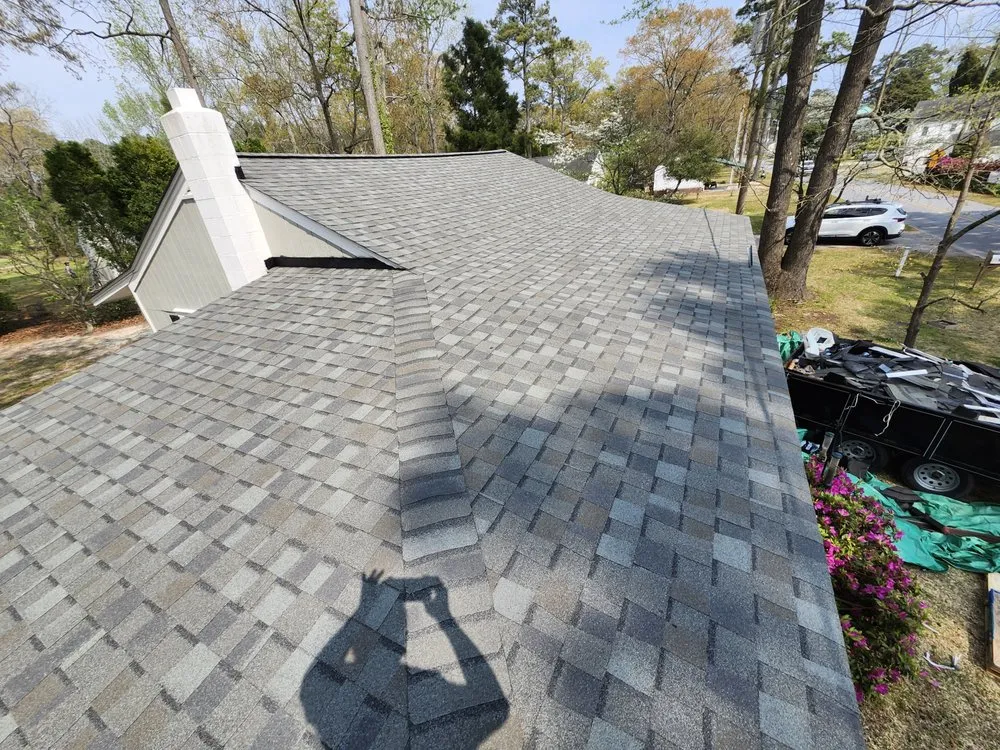 Slide of M&M Roofing