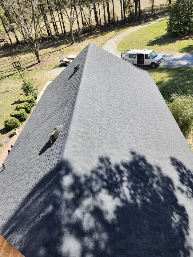 Slide of M&M Roofing