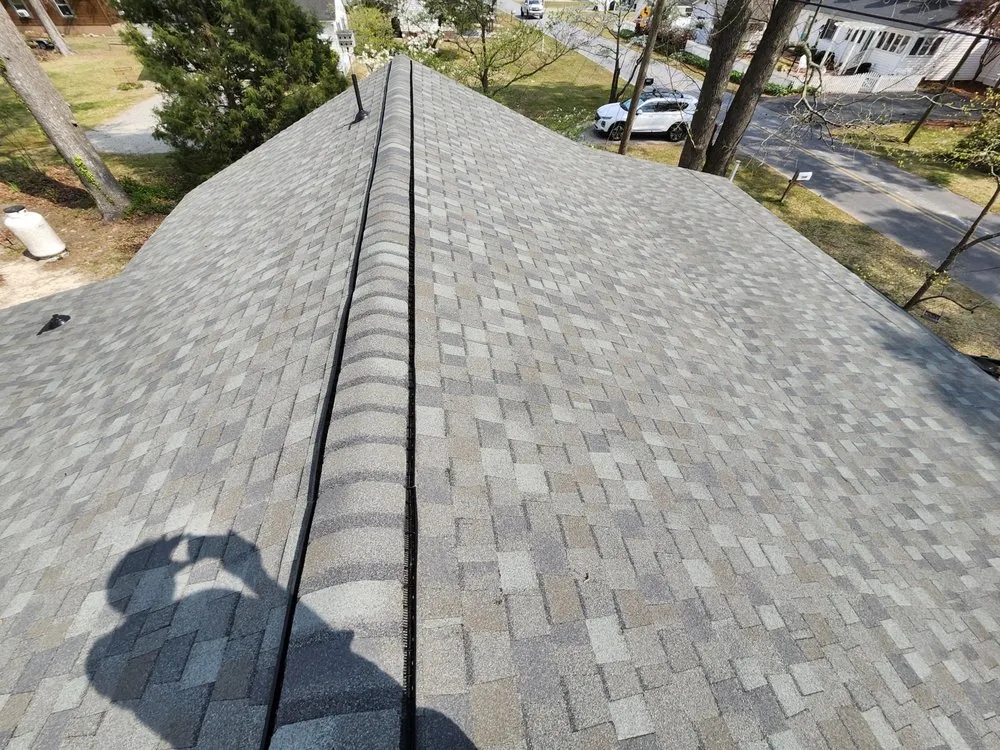 Slide of M&M Roofing