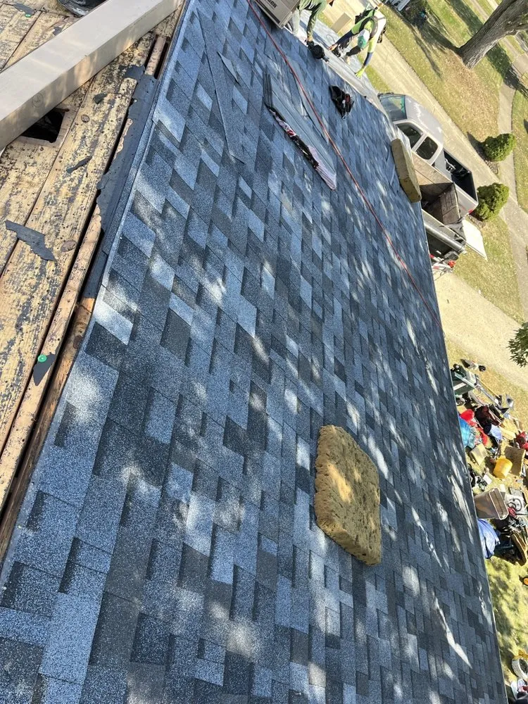 Slide of M&M Roofing