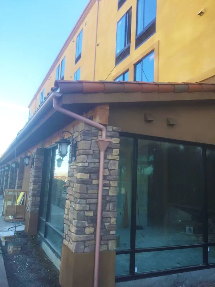 Slide of M&M Sheet Metal and Rain Gutters