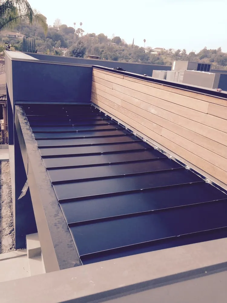 Slide of M&M Sheet Metal and Rain Gutters