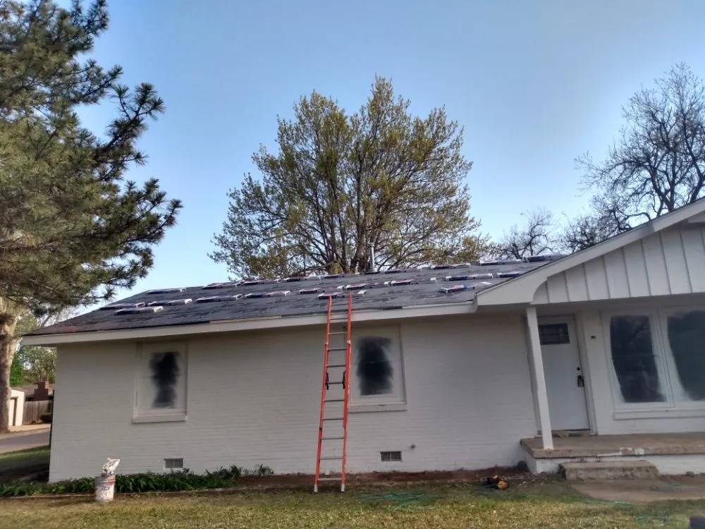 Slide of MMJ Roofing