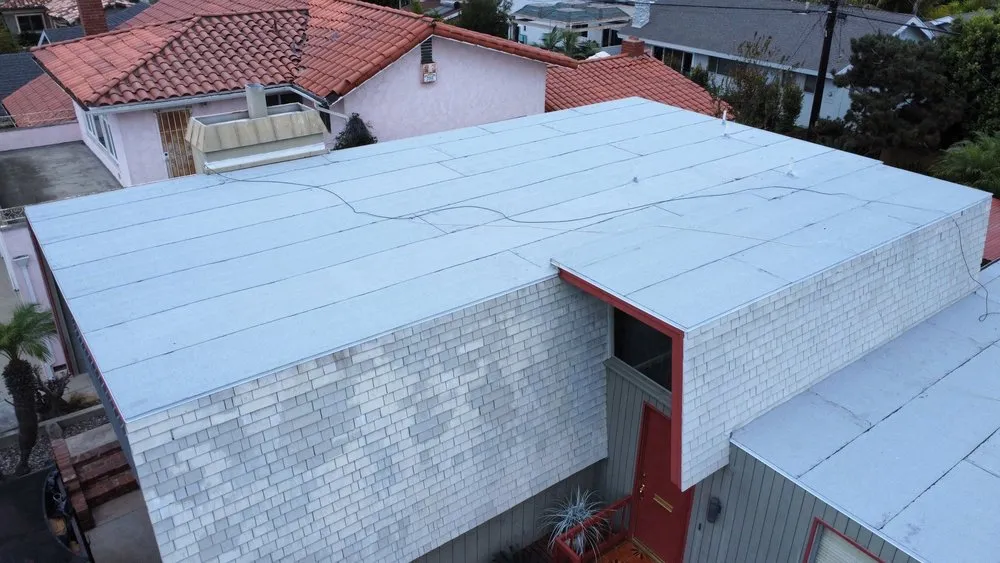 Slide of MMM Roofing