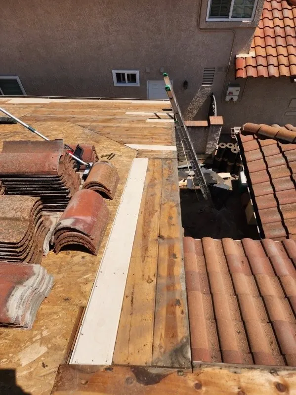 Slide of MMM Roofing