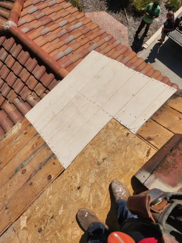 Slide of MMM Roofing