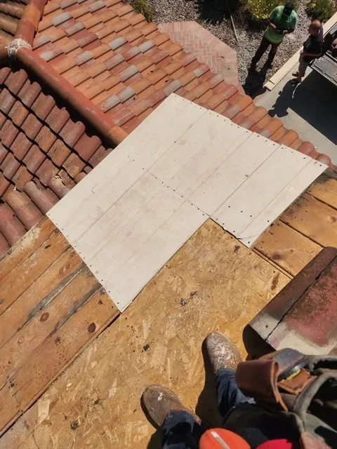 Slide of MMM Roofing