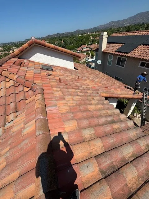 Slide of MMM Roofing