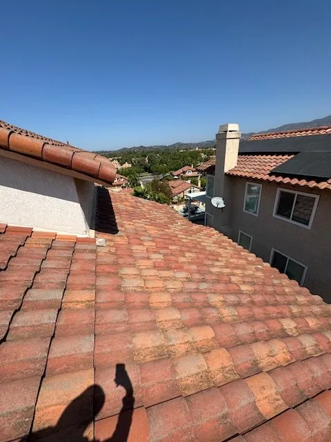 Slide of MMM Roofing