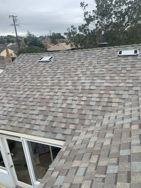 Slide of MNJ Roofing