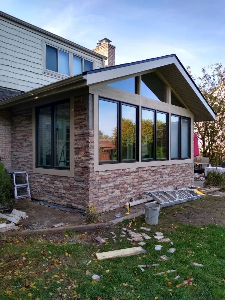 Local roof leak repair same-day service in Commerce Charter Township, MI by MNM Construction