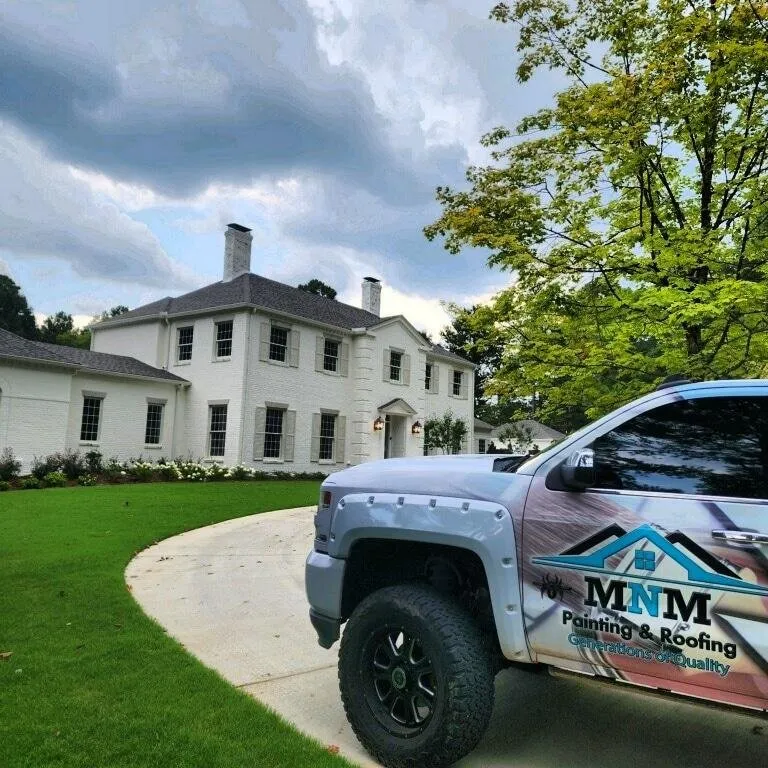 Slide of MNM Painting & Roofing