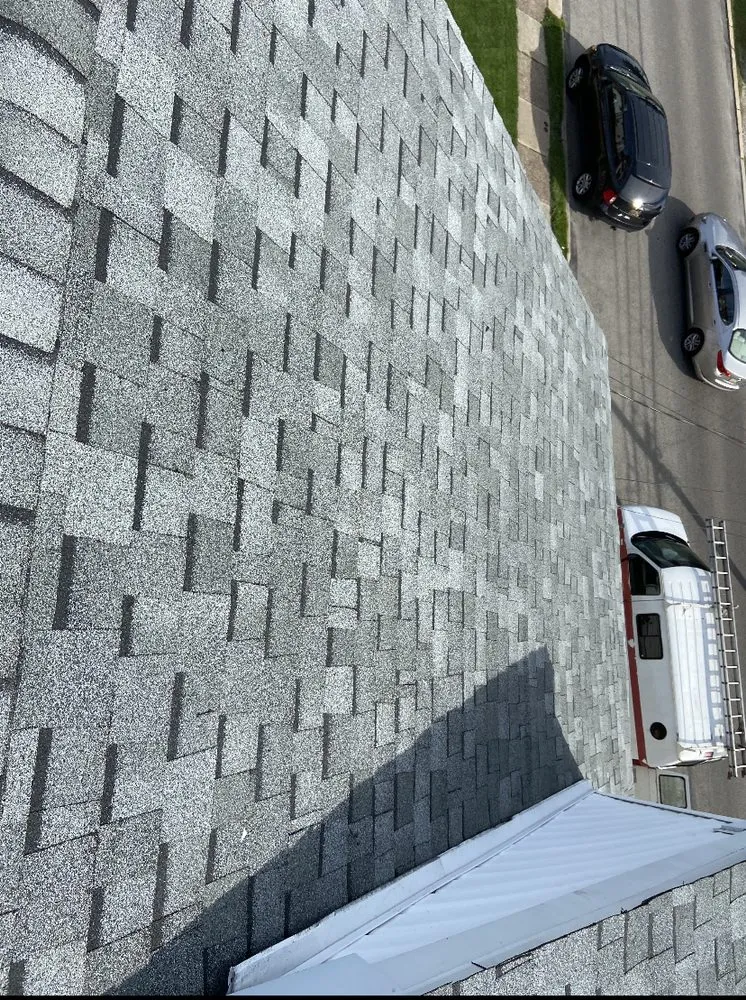 Slide of MnM Roofing