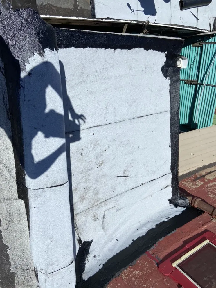 Slide of MnM Roofing