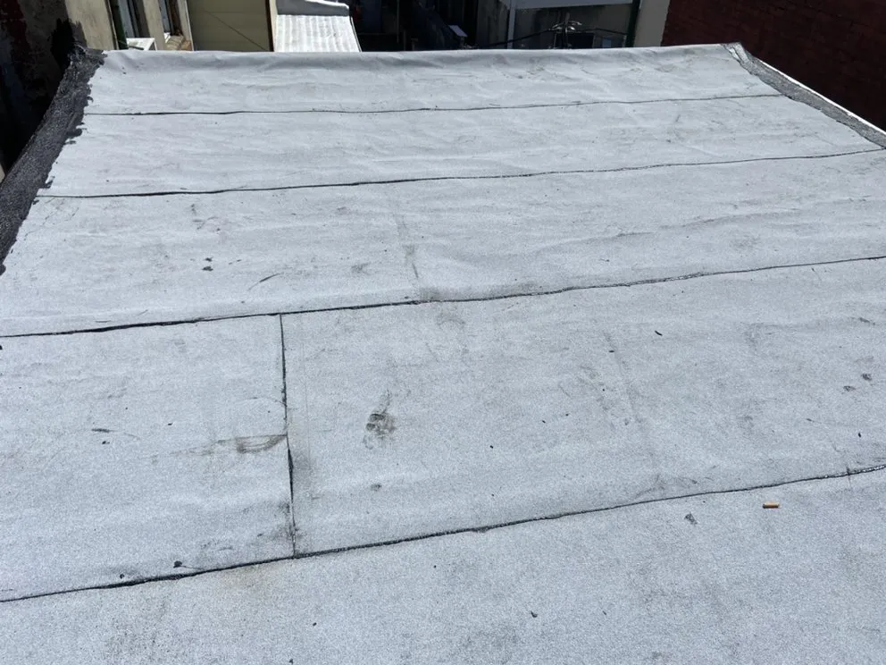 Slide of MnM Roofing