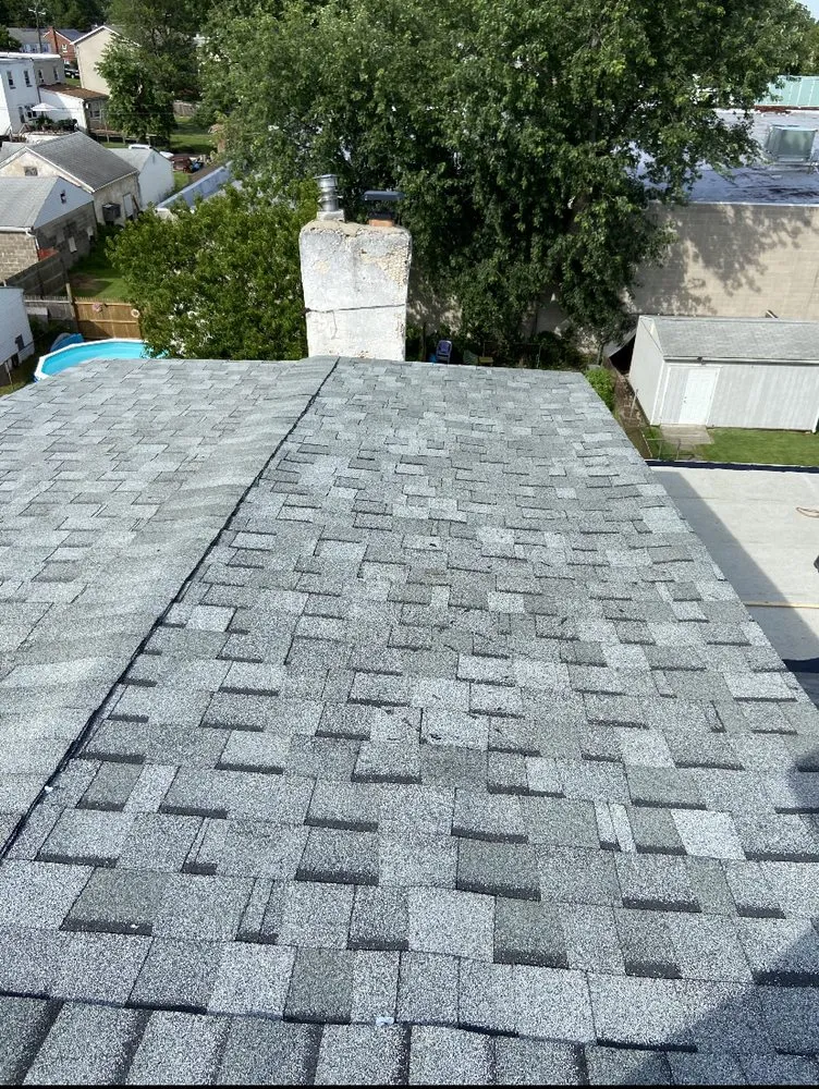 Slide of MnM Roofing