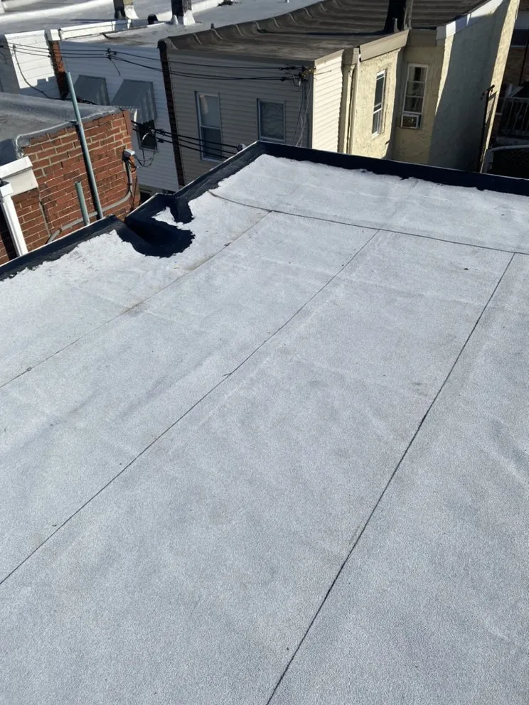 Slide of MnM Roofing