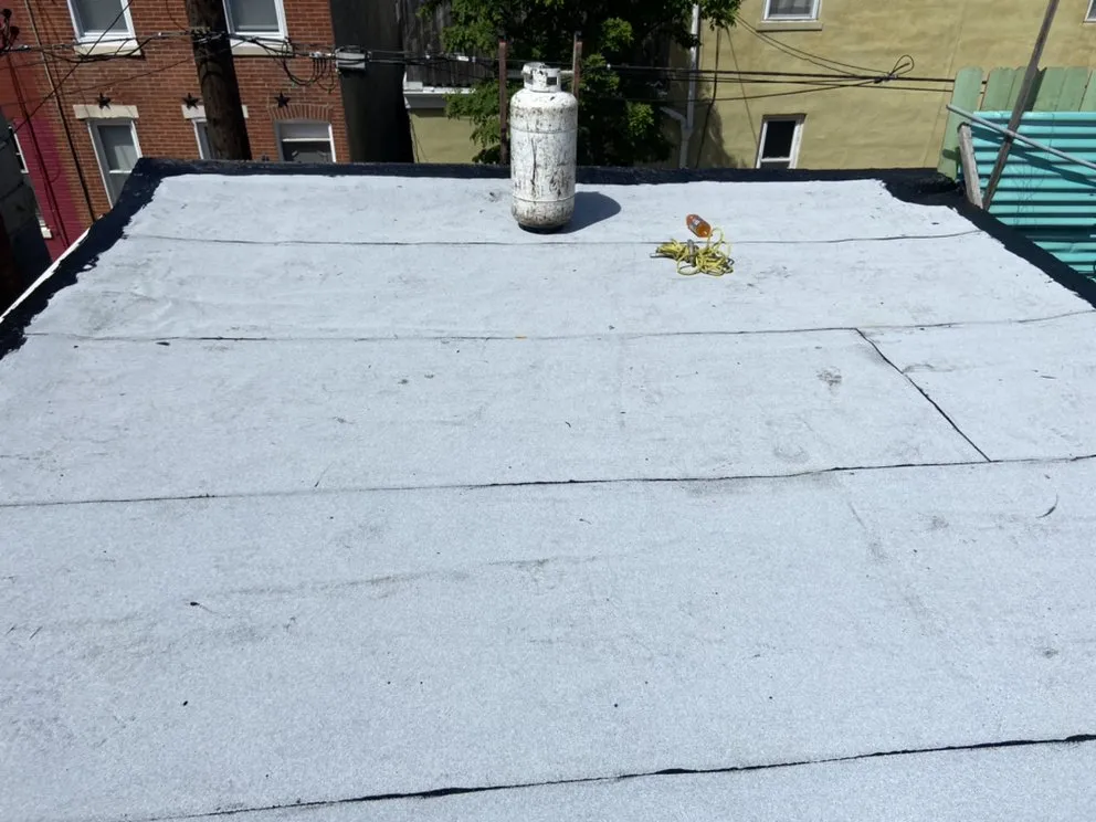 Slide of MnM Roofing