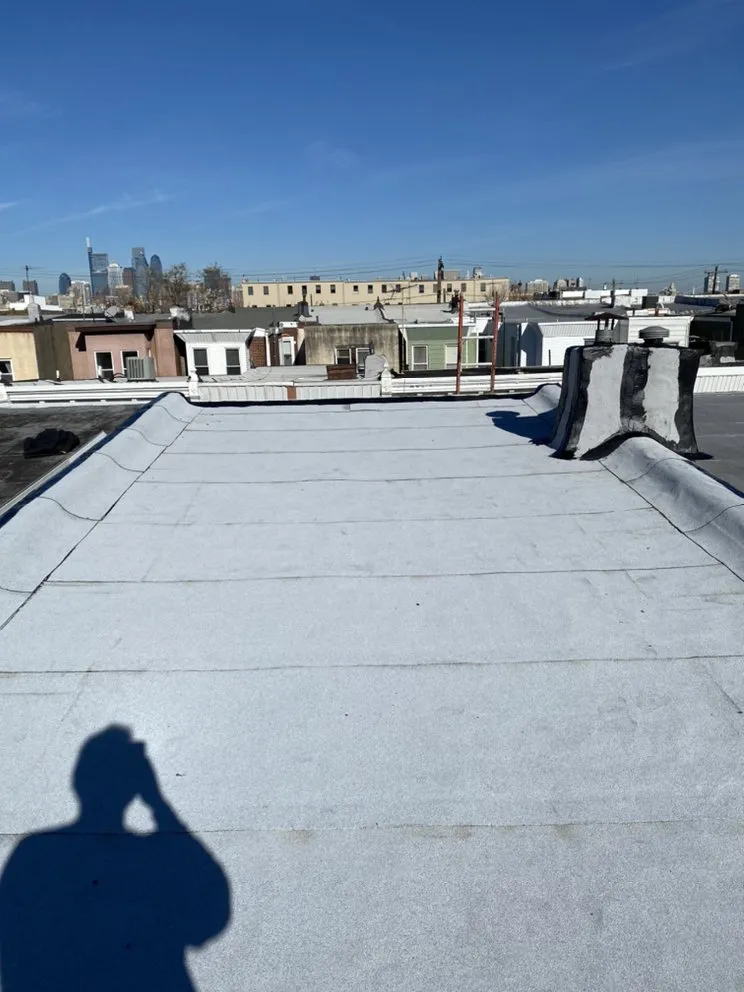 Slide of MnM Roofing