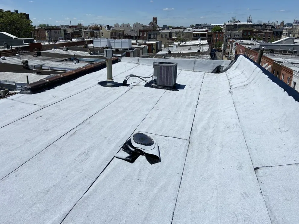 Slide of MnM Roofing