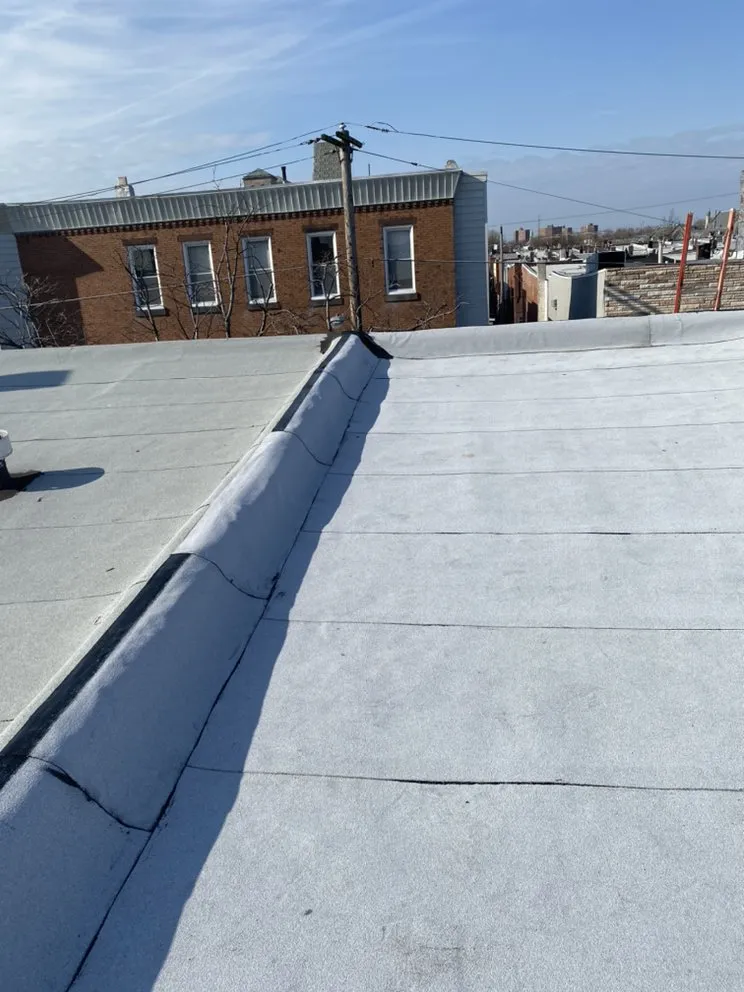 Slide of MnM Roofing