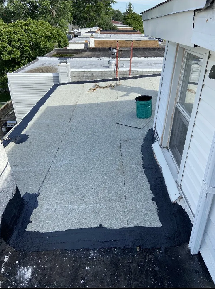 Slide of MnM Roofing