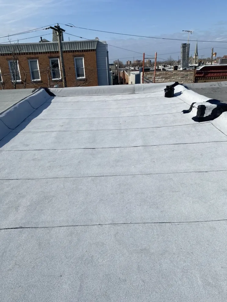 Slide of MnM Roofing