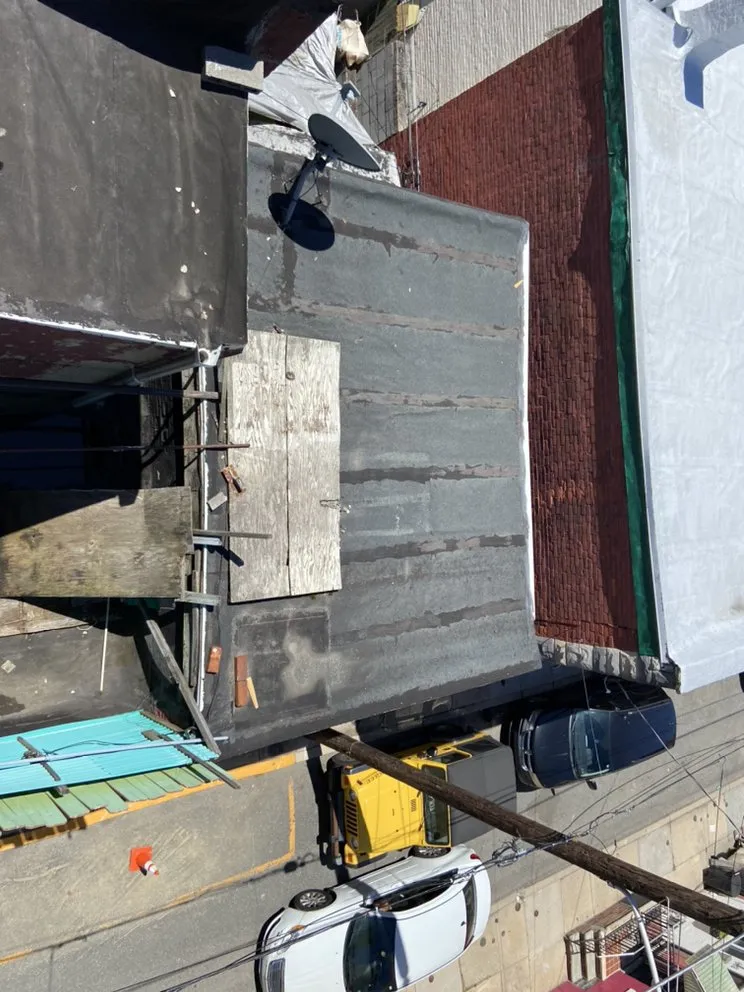 Slide of MnM Roofing