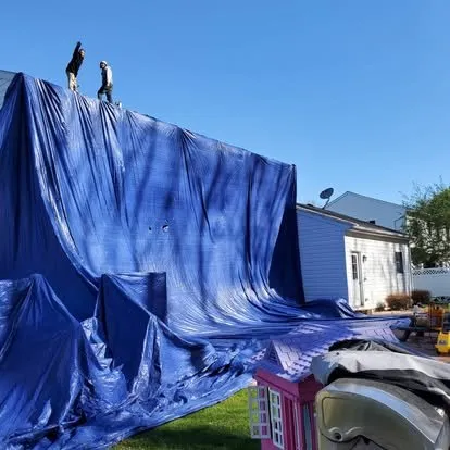 Slide of MNM Roofing Professionals