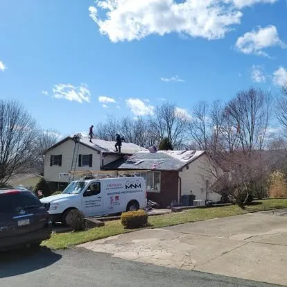 Slide of MNM Roofing Professionals