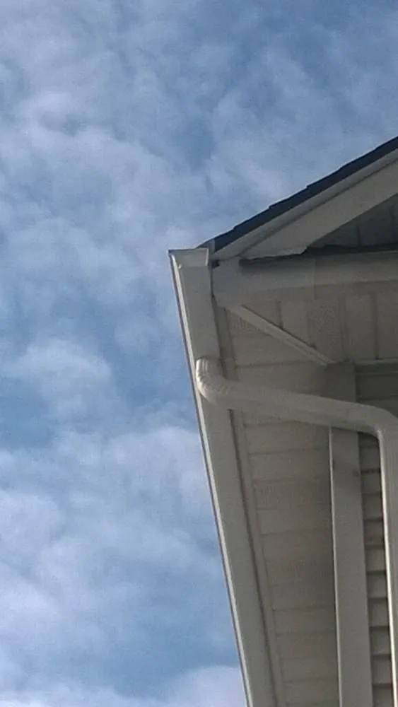 Slide of MNT Roofing & Siding