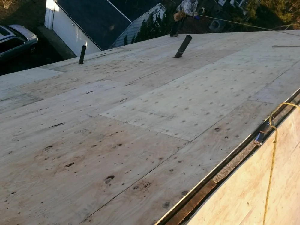 Slide of MNT Roofing & Siding